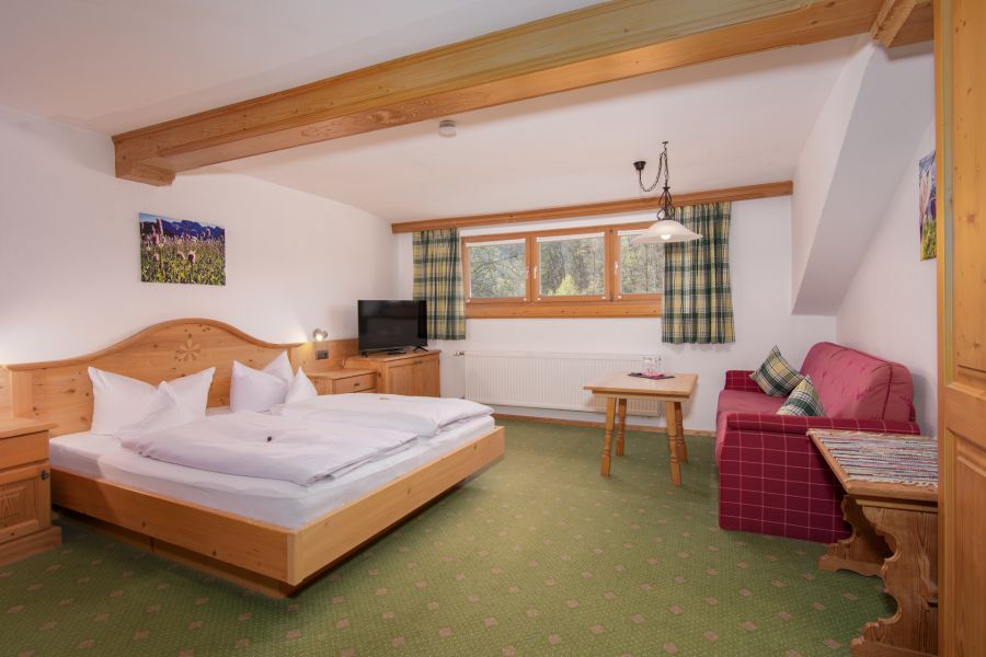 Doppelbett im Gästehaus in Rottach-Egern am Tegernsee